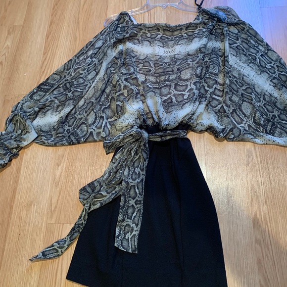 Jessica Simpson Dresses & Skirts - Snake skin tight dress with big arms